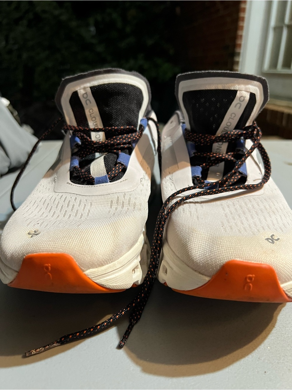 On Running Women’s Athletic Shoes in White, Orange, Black
